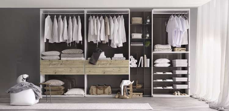 Stylish and Functional Open Wardrobe with Organized Storage Modern open wardrobe with hanging clothes, folded linens, and various storage compartments, providing an organized and stylish solution for home storage.